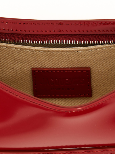 Shop Jacquemus Le Bisou Ceinture Shoulder Bag In Red