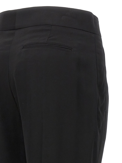 Shop Tom Ford Metal Bar Detail Trousers In Black