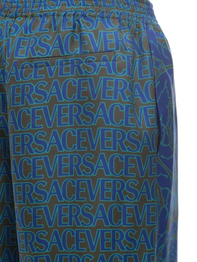 Shop Versace Silk Bermuda Shorts With  Allover Print