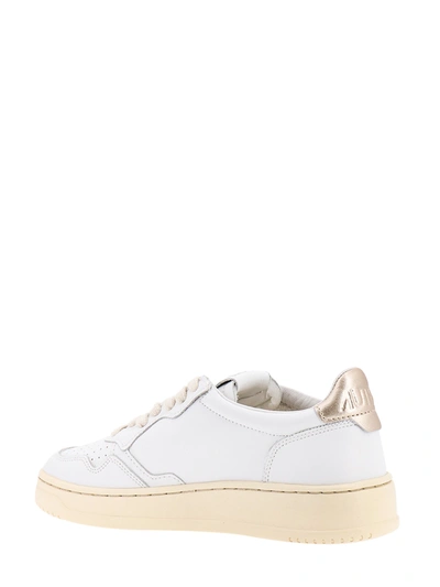 Shop Autry Leather Sneakers In Oro
