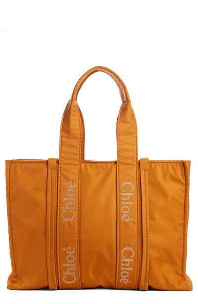Shop Chloé Medium Woody Textile Tote In Golden Yellow 775