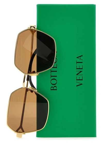 Shop Bottega Veneta Woman Gold Metal Sunglasses