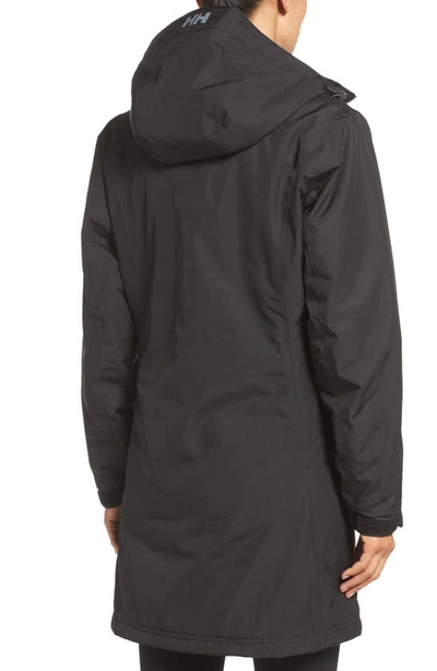 Shop Helly Hansen Belfast Long Waterproof Winter Rain Jacket In Black