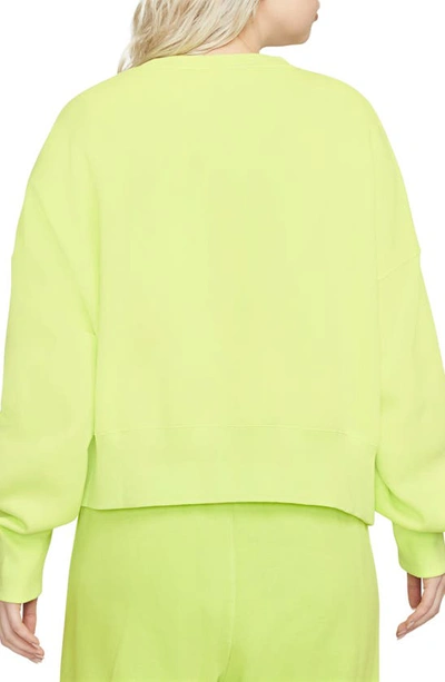 Shop Nike Phoenix Fleece Crewneck Sweatshirt In Light Lemon Twist/ Sail
