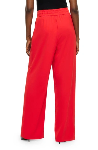 Shop River Island Pleated Wide Leg Trousers In Red