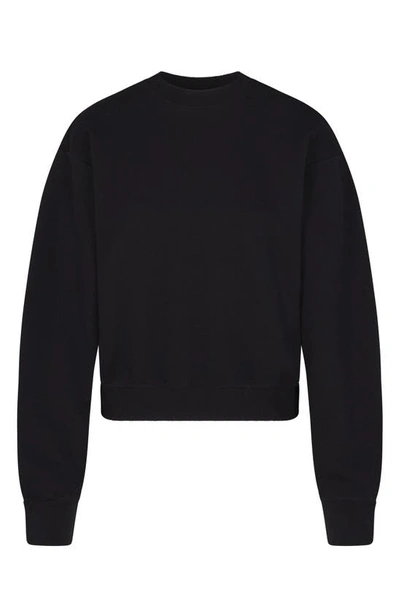 Shop Skims Cotton Blend Fleece Classic Crew Sweatshirt In Onyx