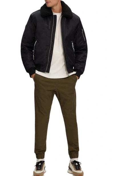 Noize Brian Faux Shearling Collar Water Resistant Short Bomber Jacket In Black