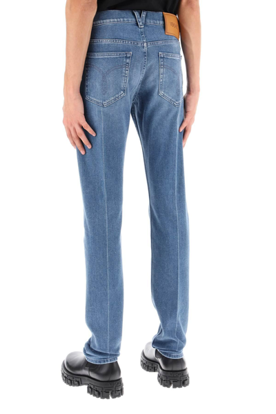 Shop Versace Stretch Denim Slim Fit Jeans In Light Blue