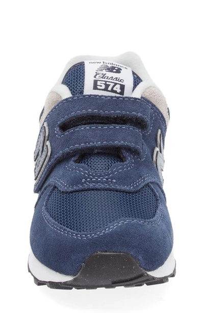 Shop New Balance Kids' 574 Sneaker In Navy