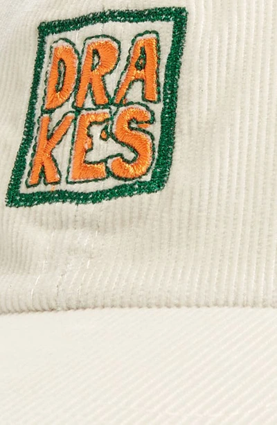 Shop Drake's Embroidered Logo Corduroy Baseball Cap In Ivory