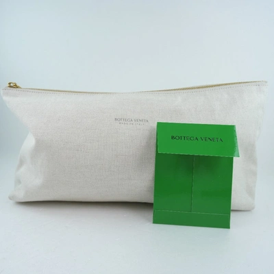 Shop Bottega Veneta Bag-in-bag Beige Canvas Clutch Bag ()