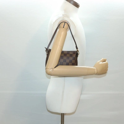 Louis Vuitton Trousse Makeup Brown Canvas Clutch Bag (Pre-Owned