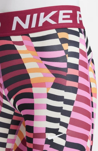 Shop Nike Kids' Allover Print Dri-fit Sport Leggings In Playful Pink/ Noble Red/ White