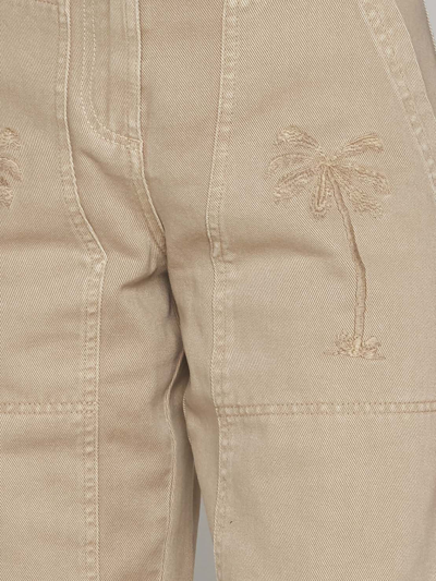 Shop Palm Angels Beige Cotton Trousers