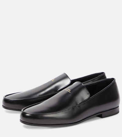 Shop Totême The Oval Leather Loafers In Black