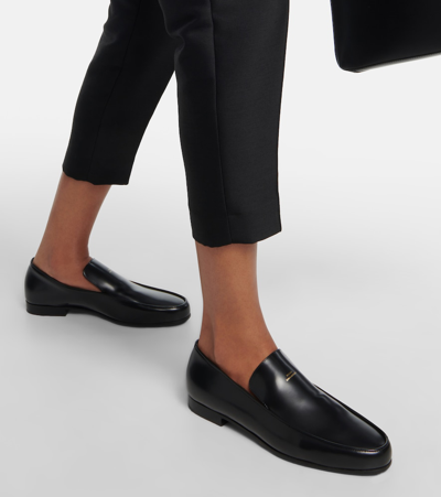 Shop Totême The Oval Leather Loafers In Black