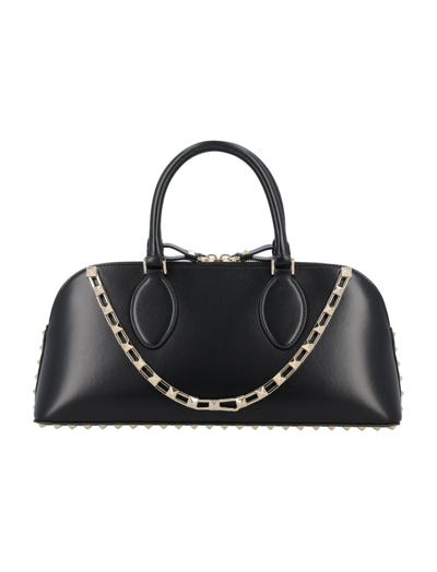 Shop Valentino Garavani Rockstud Zipped Medium Tote Bag In Black