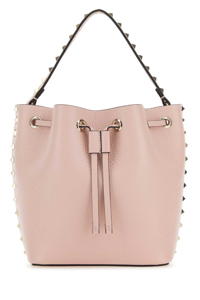 Shop Valentino Rockstud Drawstring Bucket Bag In Pink