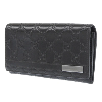 Shop Gucci -- Black Leather Wallet  ()