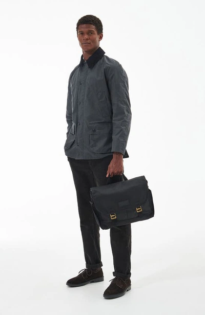 Shop Barbour Essential Waxed Cotton Messenger Bag In Black