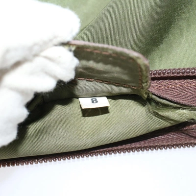 Shop Prada Green Synthetic Clutch Bag ()