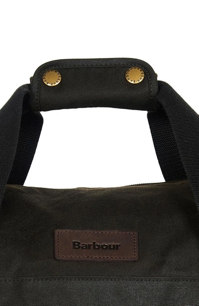 Shop Barbour Explorer Waxed Cotton Canvas Duffle Bag In Olive