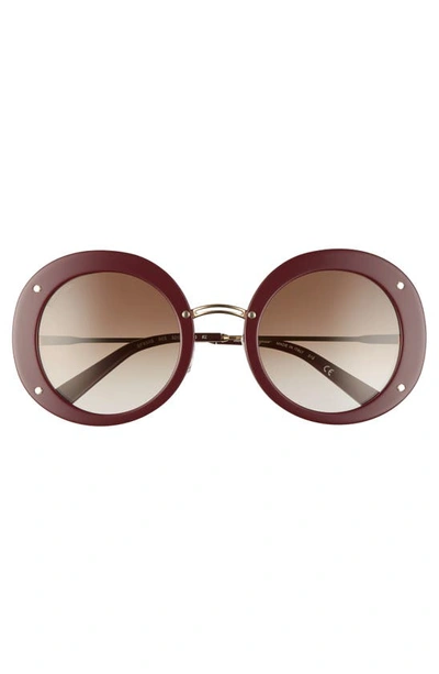 Shop Ferragamo Salvatore  52mm Gancio Round Sunglasses In Bordeaux
