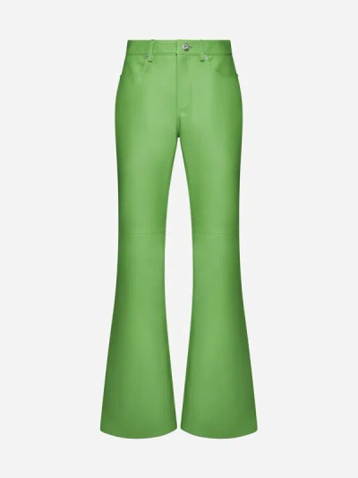 Shop Jw Anderson Bootcut Leather Trousers In Green