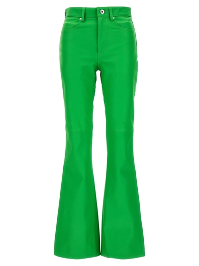 Shop Jw Anderson Leather Bootcut Pants In Green