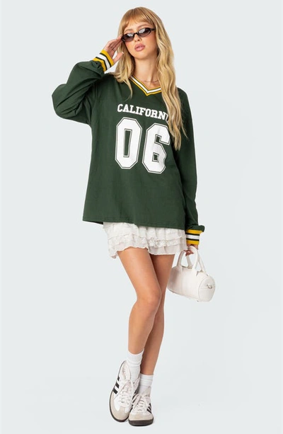 Shop Edikted Cali 06 Oversize Long Sleeve Cotton Graphic Football T-shirt In Green