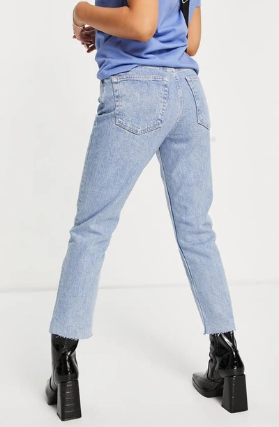 Shop Topshop Raw Hem Straight Leg Jeans In Mid Blue