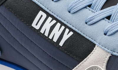 Shop Dkny Mixed Media Runner Sneaker In Navy