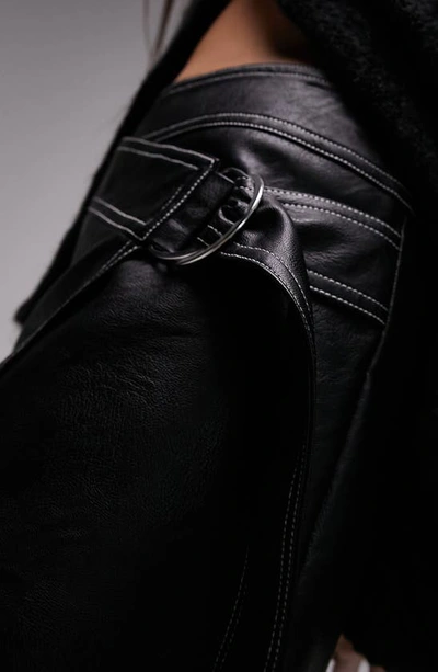 Shop Topshop Faux Leather Wrap Miniskirt In Black