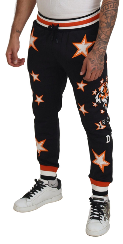 Shop Dolce & Gabbana Black Orange Star Trousers Sport Men's Pants