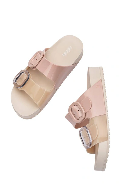 Shop Melissa Cozy Buckle Slide Sandal In Beige/ Pink
