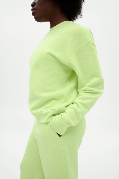 Shop Girlfriend Collective Glow 50/50 Classic Sweatshirt