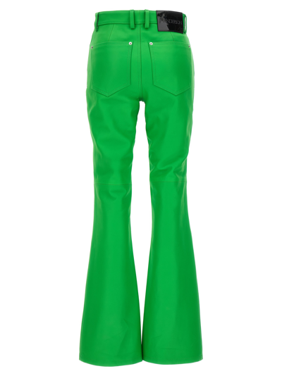 Shop Jw Anderson Leather Bootcut Trousers In Green