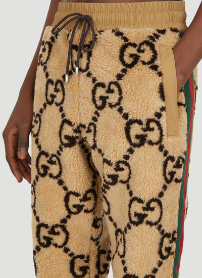 Shop Gucci Men Gg Jacquard Faux Fur Track Pants In Cream