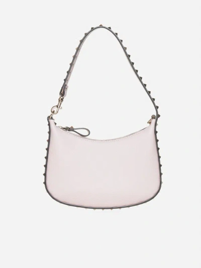 Shop Valentino Rockstud Leather Mini Hobo Bag In Rose Quartz