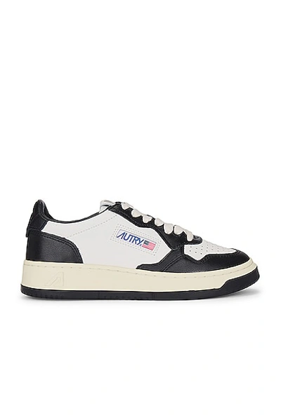 Shop Autry Medalist Low Sneaker In Leather  Leather White  & Leather Black