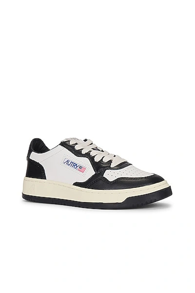 Shop Autry Medalist Low Sneaker In Leather  Leather White  & Leather Black