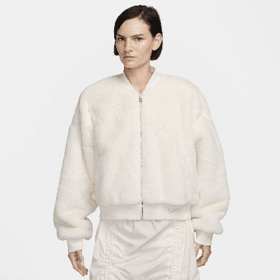 Shop Nike Women's  Sportswear Reversible Faux Fur Bomber In White