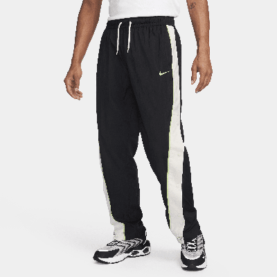Shop Nike Men's Woven Basketball Pants In Black