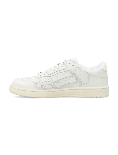 Shop Amiri Skel Top Low Sneakers In White