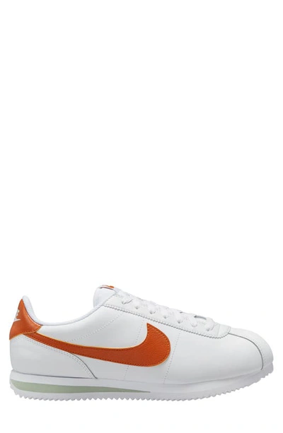 Shop Nike Cortez Sneaker In White/ Campfire Orange/ Jade