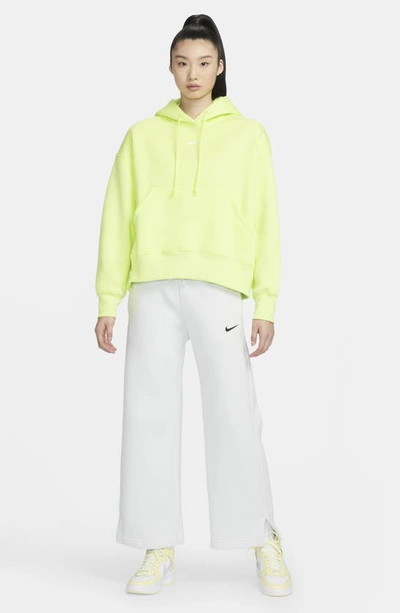 Shop Nike Sportswear Phoenix Fleece Pullover Hoodie In Light Lemon Twist/ Sail