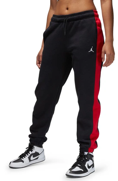 Shop Jordan Brooklyn Fleece Sweatpants In Black/ Gym Red/ White
