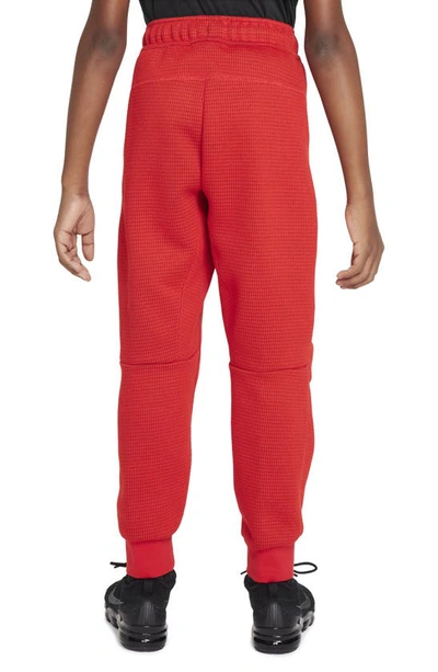 Shop Nike Kids' Tech Fleece Sweatpants In University Red/ Red/ Black