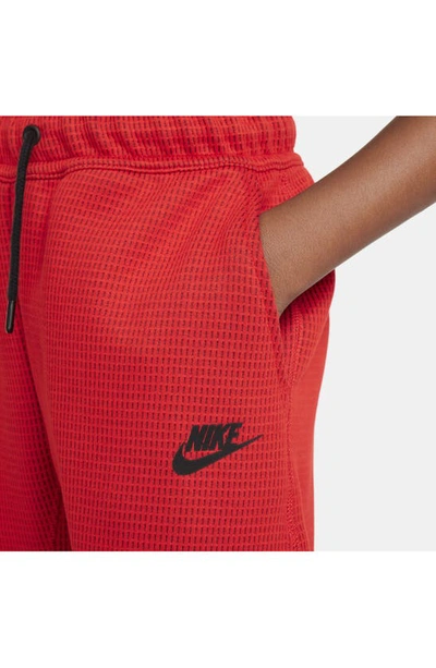 Shop Nike Kids' Tech Fleece Sweatpants In University Red/ Red/ Black