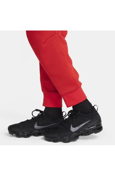 Shop Nike Kids' Tech Fleece Sweatpants In University Red/ Red/ Black
